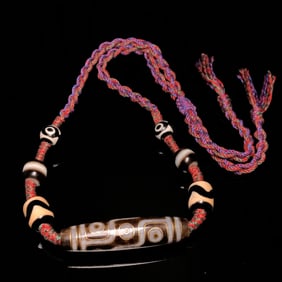 A Chinese Carved Agate DZI Bead