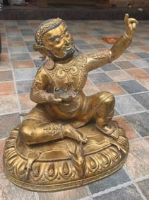 A Chinese Gilt Bronze Figure of Buddha