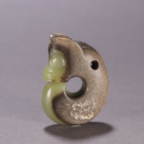 A Chinese Carved Jade Dragon Pendant