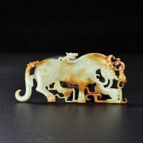 A Chinese Carved Jade Foo-Dog Pendant