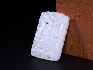 A Chinese Carved Jade Fasting Pendant