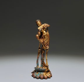 A Chinese Gilt Bronze Figure of Musician