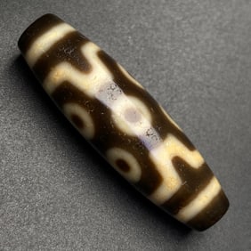 A Chinese Carved Agate DZI Bead
