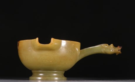 A Chinese Carved Jade Spoon with Handle