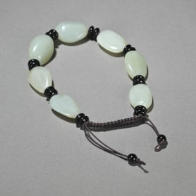 A Chinese Carved Jade Bracelet
