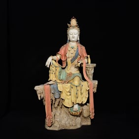A Chinese Famille-Rose Porcelain Figure of Buddha