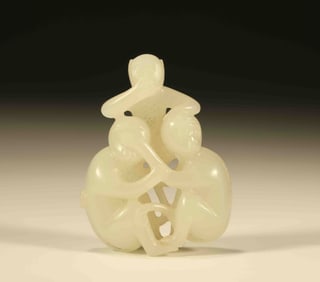A Chinese Carved Jade Monkeys Statuette