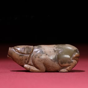 A Chinese Carved Jade Pig Statuette