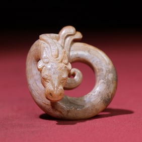 A Chinese Carved Jade Dragon Statuette