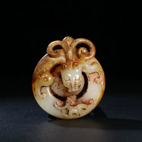 A Chinese Carved Jade Dog Statuette