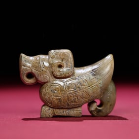 A Chinese Carved Jade Phenix Statuette