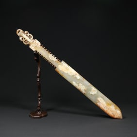 A Chinese Carved Jade Sword