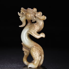 A Chinese Carved Jade Dragon Statuette