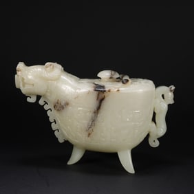 A Chinese Carved Jade Foo-Dog Vessel with Lid