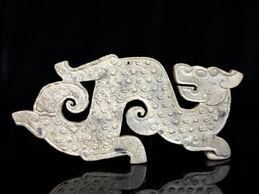 A Chinese Carved Jade Dragon Pendant