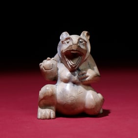 A Chinese Carved Jade Bear Statuette