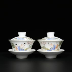 A Pair of Chinese Famille-Rose Porcelain Tea Bowls with Lids and Dishes