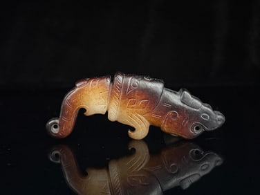A Chinese Carved Jade Dragon Statuette