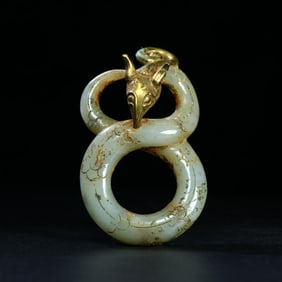 A Chinese Carved Jade Dragon Statuette