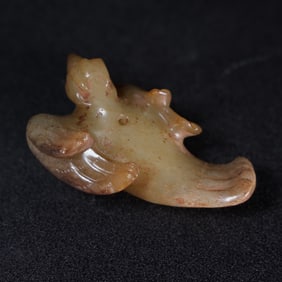 A Chinese Carved Jade Phenix Statuette