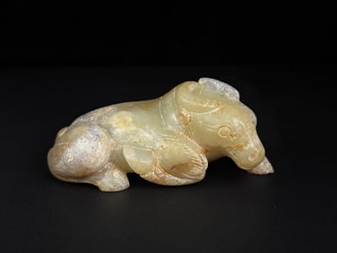 A Chinese Carved Jade Bull Statuette