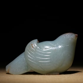 A Chinese Carved Jade Bird Statuette