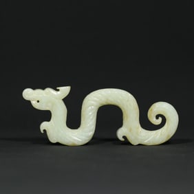 A Chinese Carved Jade Dragon Pendant