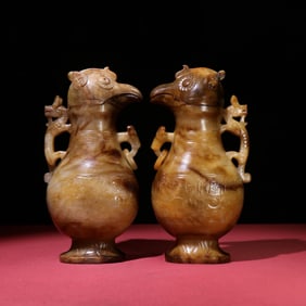 A Pair of Chinese Carved Jade Bird Head Vases