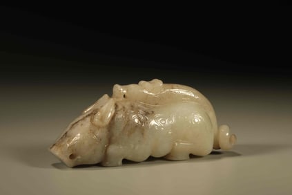 A Chinese Carved Jade Foo-Dog Statuette