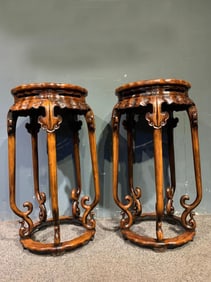 A Pair of Chinese Carved Hardwood Stands