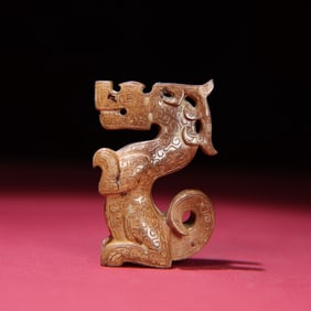 A Chinese Carved Jade Dragon Pendant