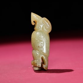 A Chinese Carved Jade Bird Statuette
