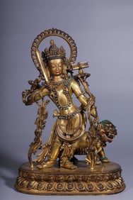 A Chinese Gilt Bronze Figure of Buddha