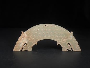 A Chinese Carved Jade Double Dragon Pendant