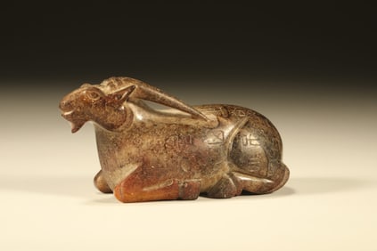 A Chinese Carved Jade Goat Statuette