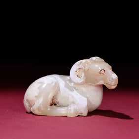 A Chinese Carved Jade Goat Statuette
