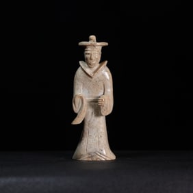 A Chinese Carved Jade Figure