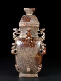 A Chinese Carved Jade Vase with Lid