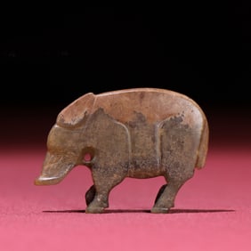A Chinese Carved Jade Pig Statuette