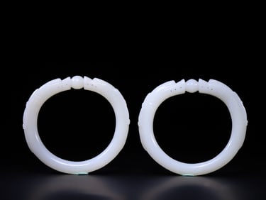 A Pair of Chinese Carved Jade Bangles