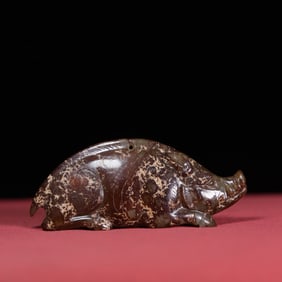 A Chinese Carved Jade Pig Statuette