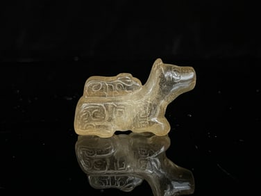 A Chinese Carved Rock Crystal Foo-Dog Statuette