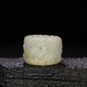 A Chinese Carved Jade Ring