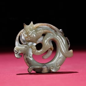 A Chinese Carved Jade Dragon Pendant