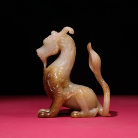 A Chinese Carved Jade Dragon Statuette