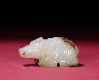 A Chinese Carved Jade Bull Statuette