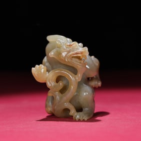 A Chinese Carved Jade Dragon Statuette