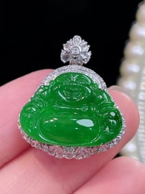 A Chinese Carved Jadeite Buddha Pendant