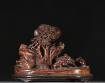 A Chinese Carved Agar-Wood Boulder Decoration