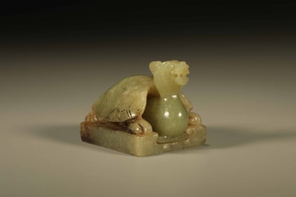 A Chinese Carved Jade Foo-Dog Handle Seal